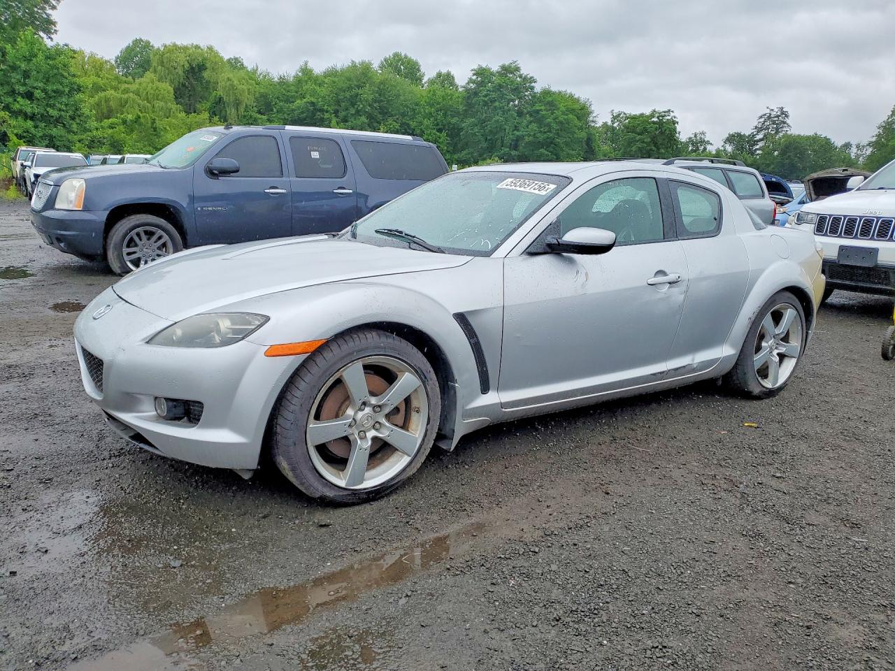2007 Mazda RX-8 Touring, VIN JM1FE173470211052 — Side