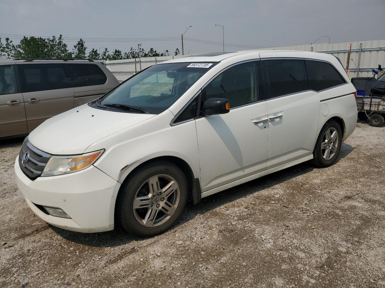 2011 Honda Odyssey Touring, VIN 5FNRL5H95BB503218 — Фото с аукциона