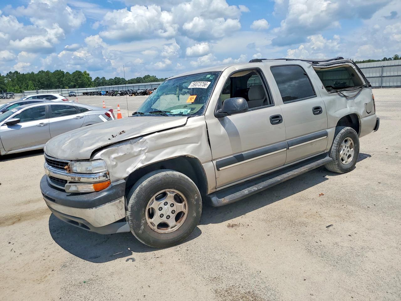 2004 Chevrolet Suburban LS, VIN 1GNEC16Z04J110935 — Rollover