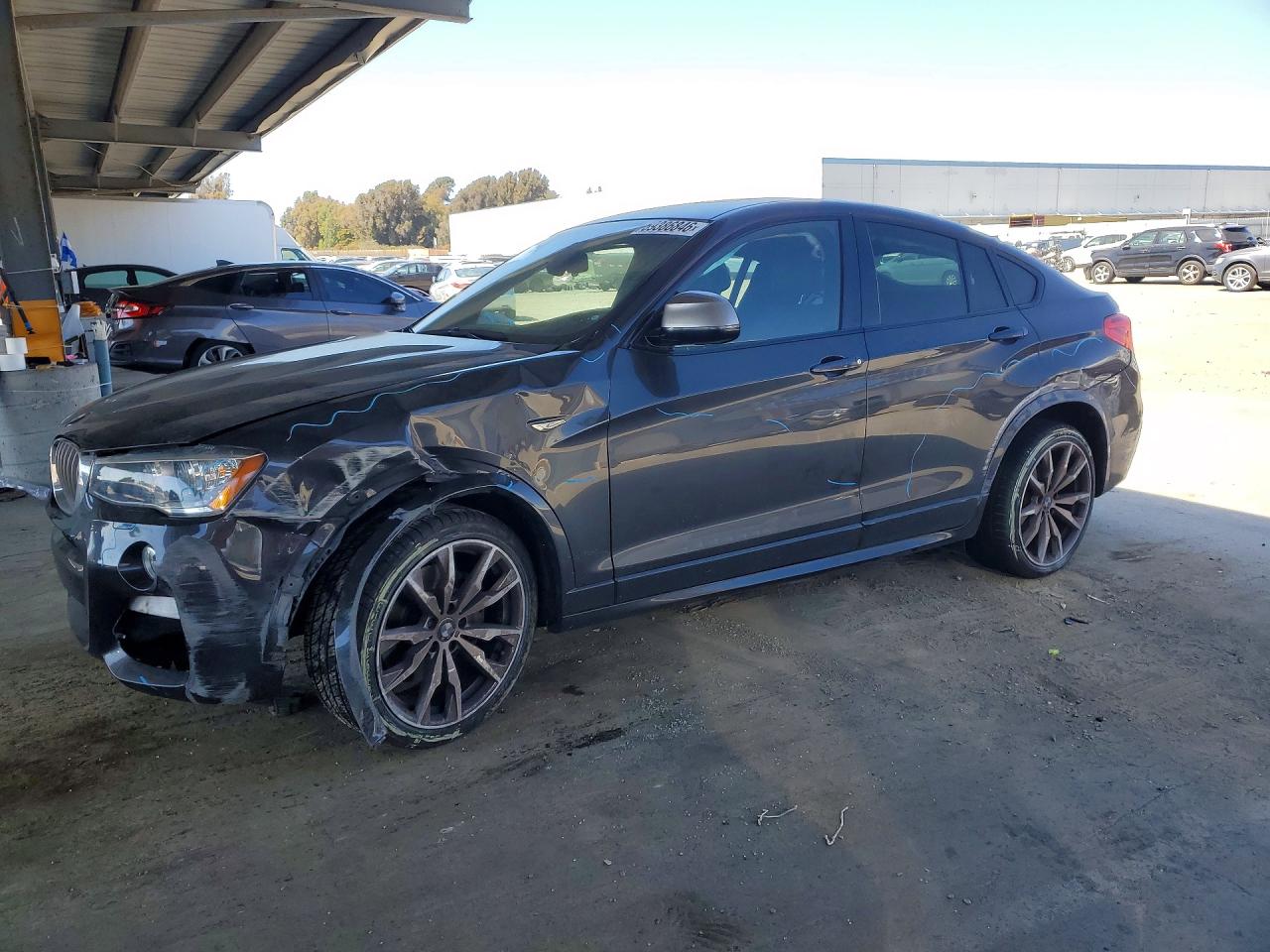 2017 BMW X4 M40i, VIN 5UXXW7C56H0U25861 — Side