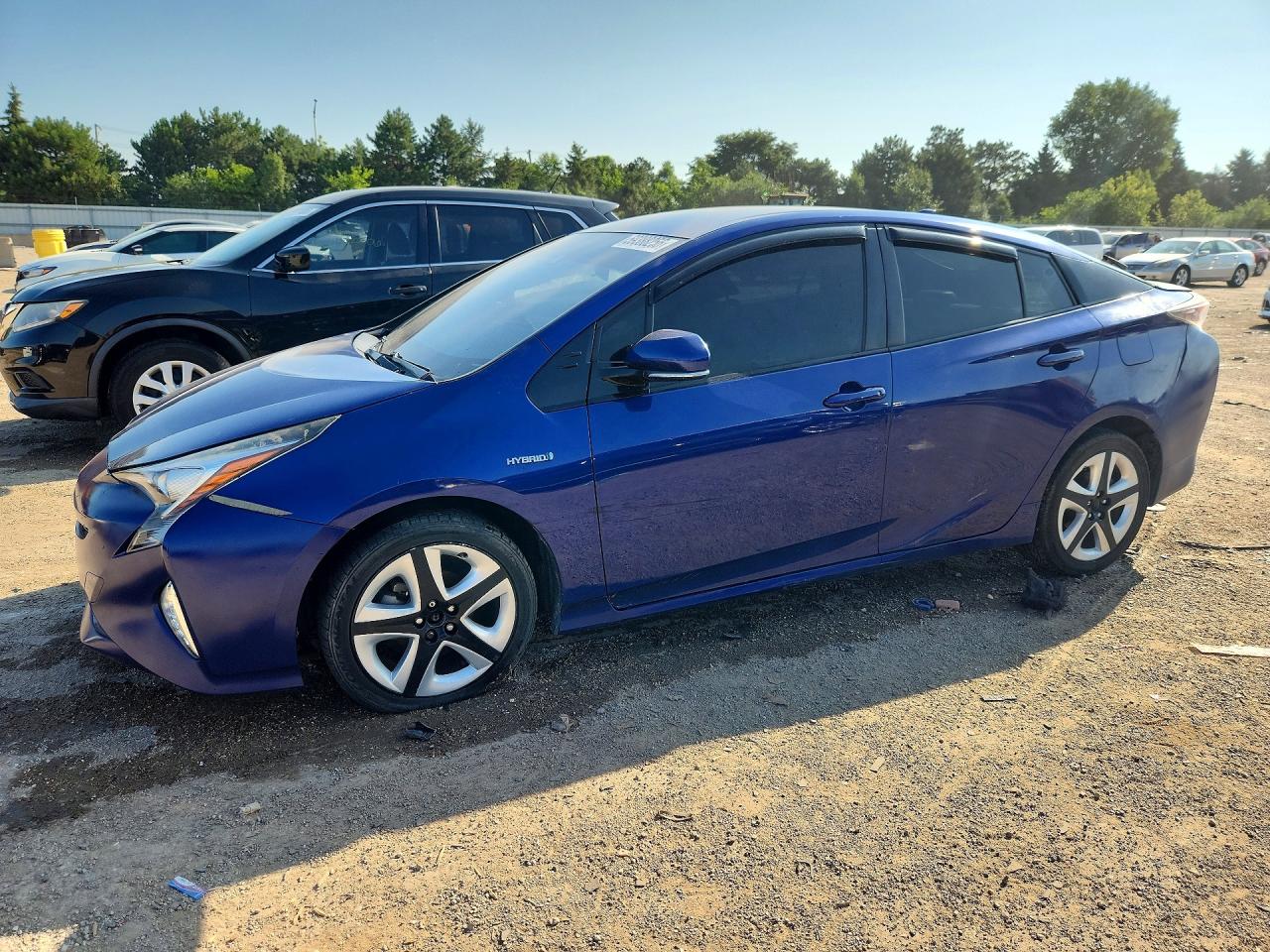 2016 Toyota Prius Three Touring, VIN JTDKARFU2G3515305 — Side