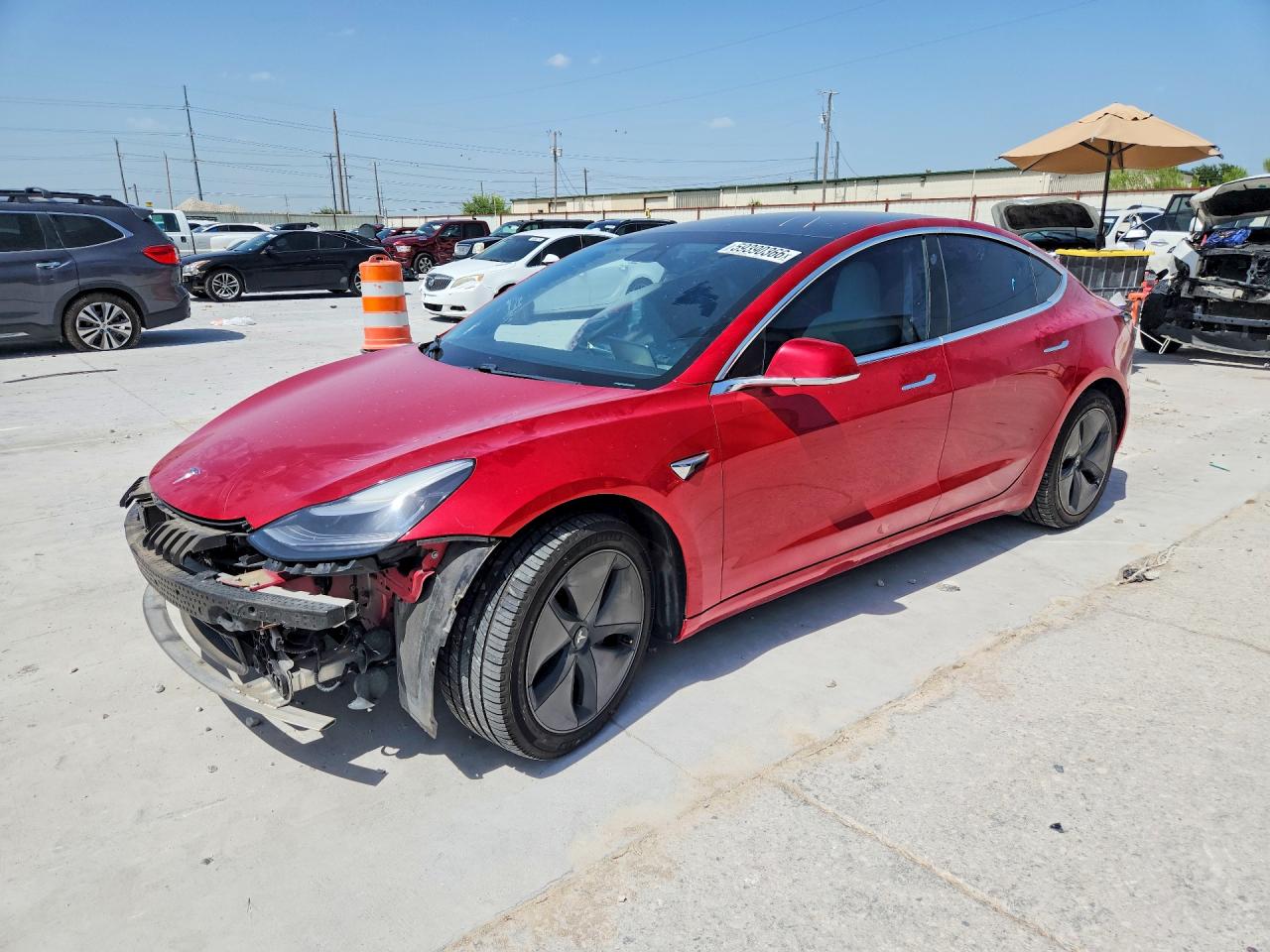 2020 Tesla Model 3 Long Range, VIN 5YJ3E1EB0LF646644 — Бок