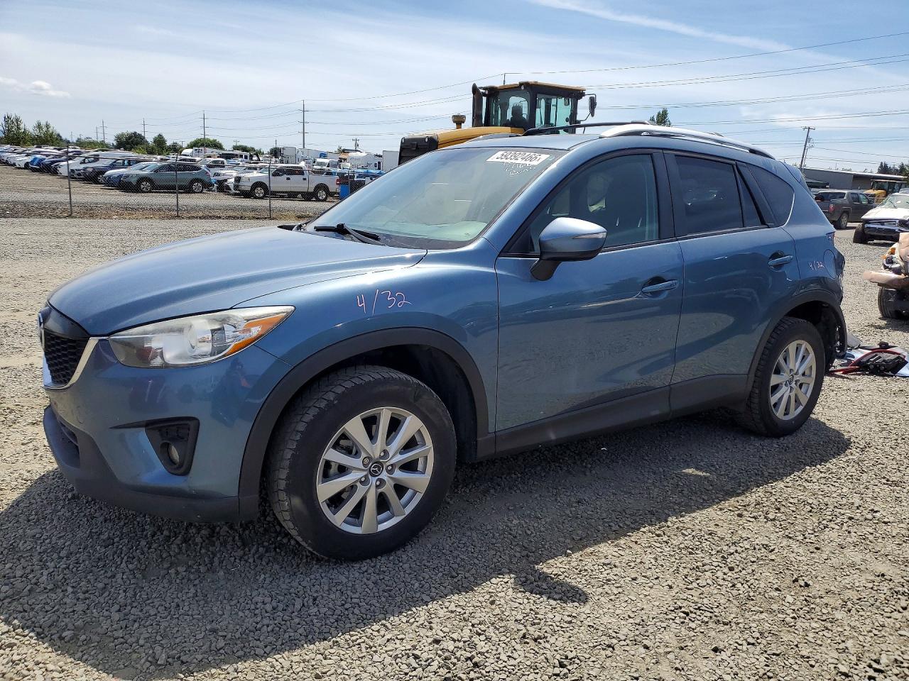 2015 Mazda CX-5 Touring, VIN JM3KE4CY1F0546471 — Зад