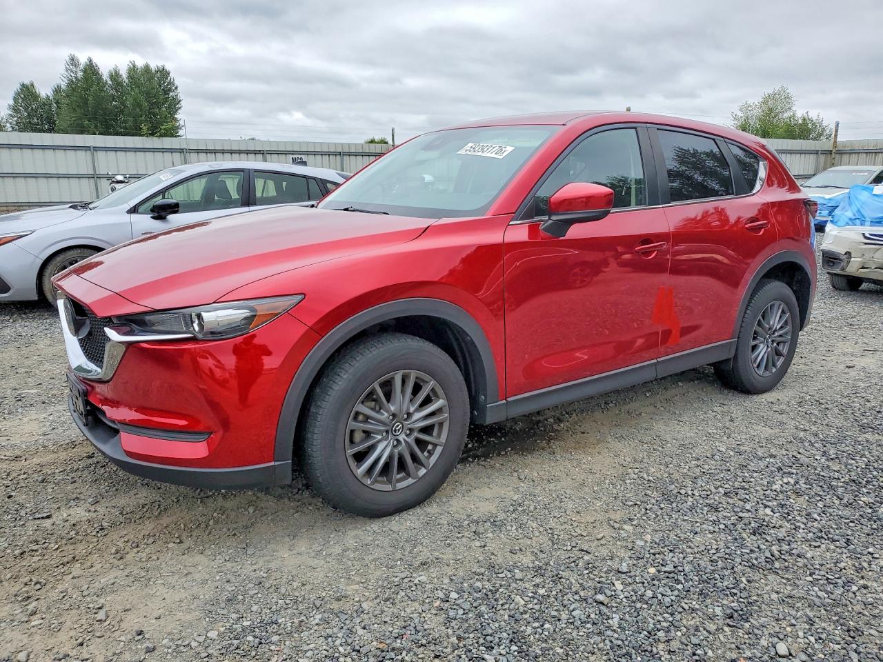2021 Mazda CX-5 Sport, VIN JM3KFABM3M0466516 — Side
