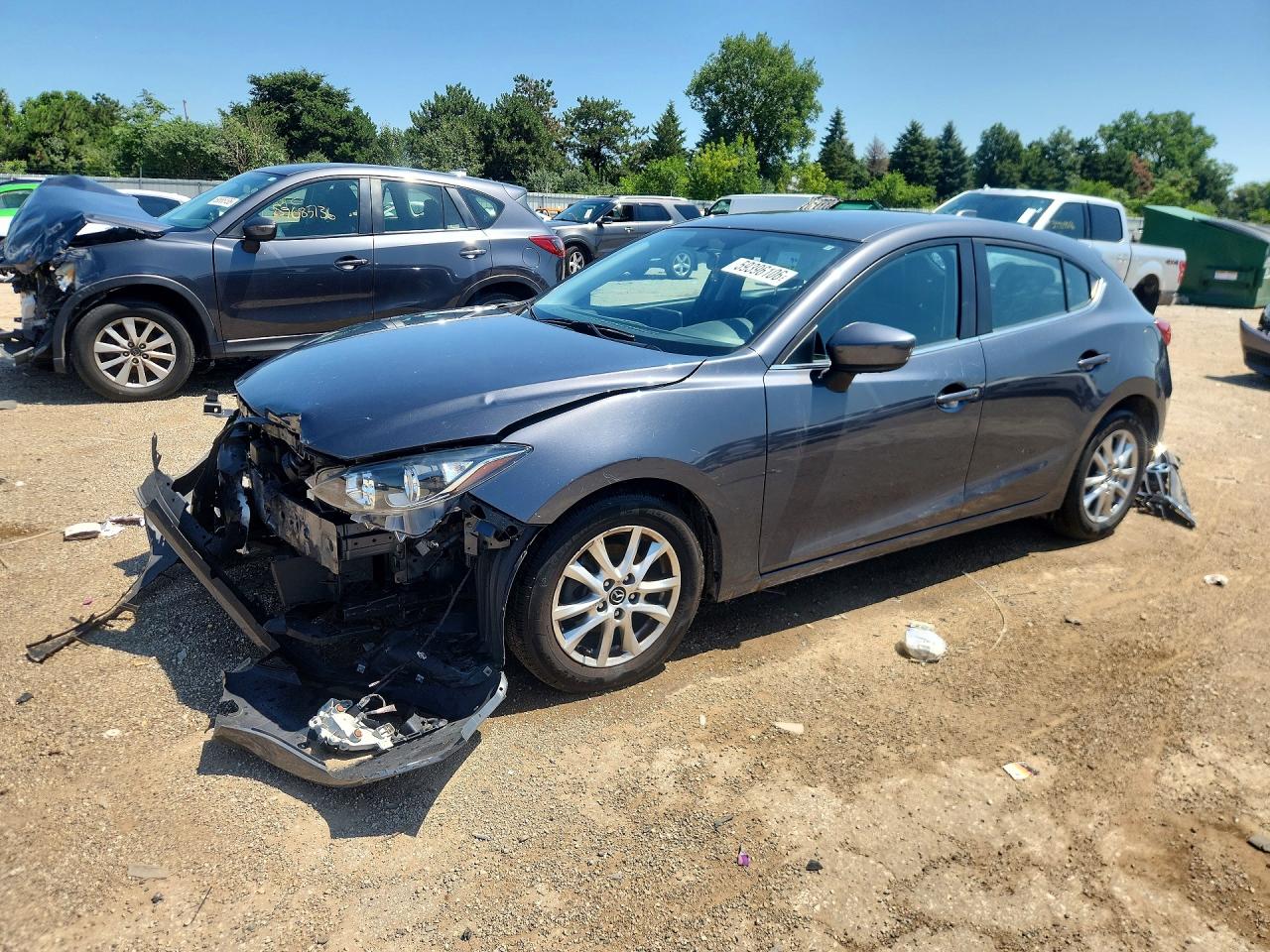 2014 Mazda 3 i Touring, VIN JM1BM1L78E1202677 — Перед