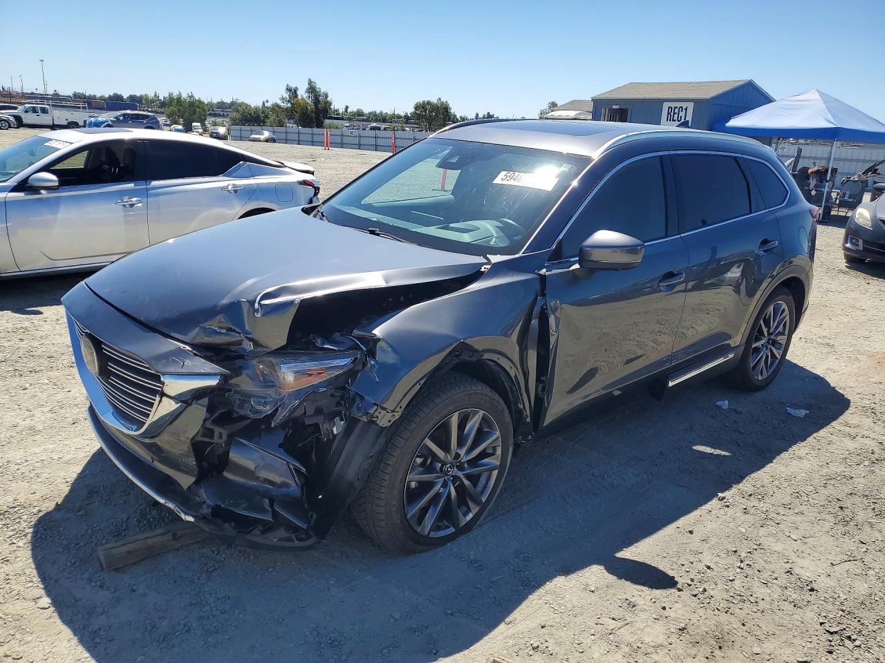 2021 Mazda CX-9 Grand Touring, VIN JM3TCADY0M0510999 — Front end