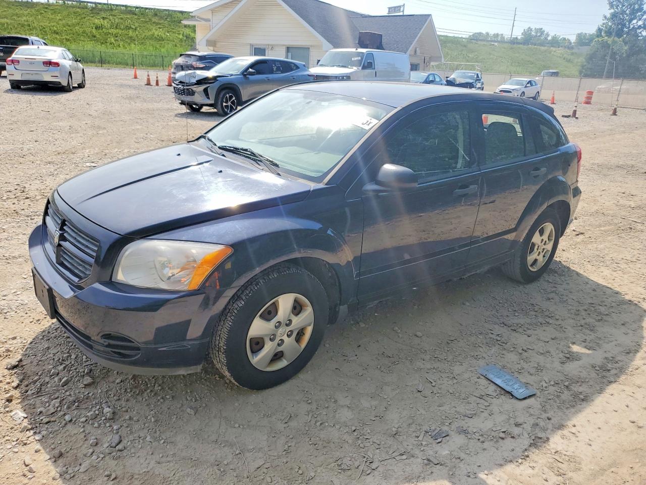 2011 Dodge Caliber, VIN 1B3CB1HA0BD120422 — Minor dents and scratches
