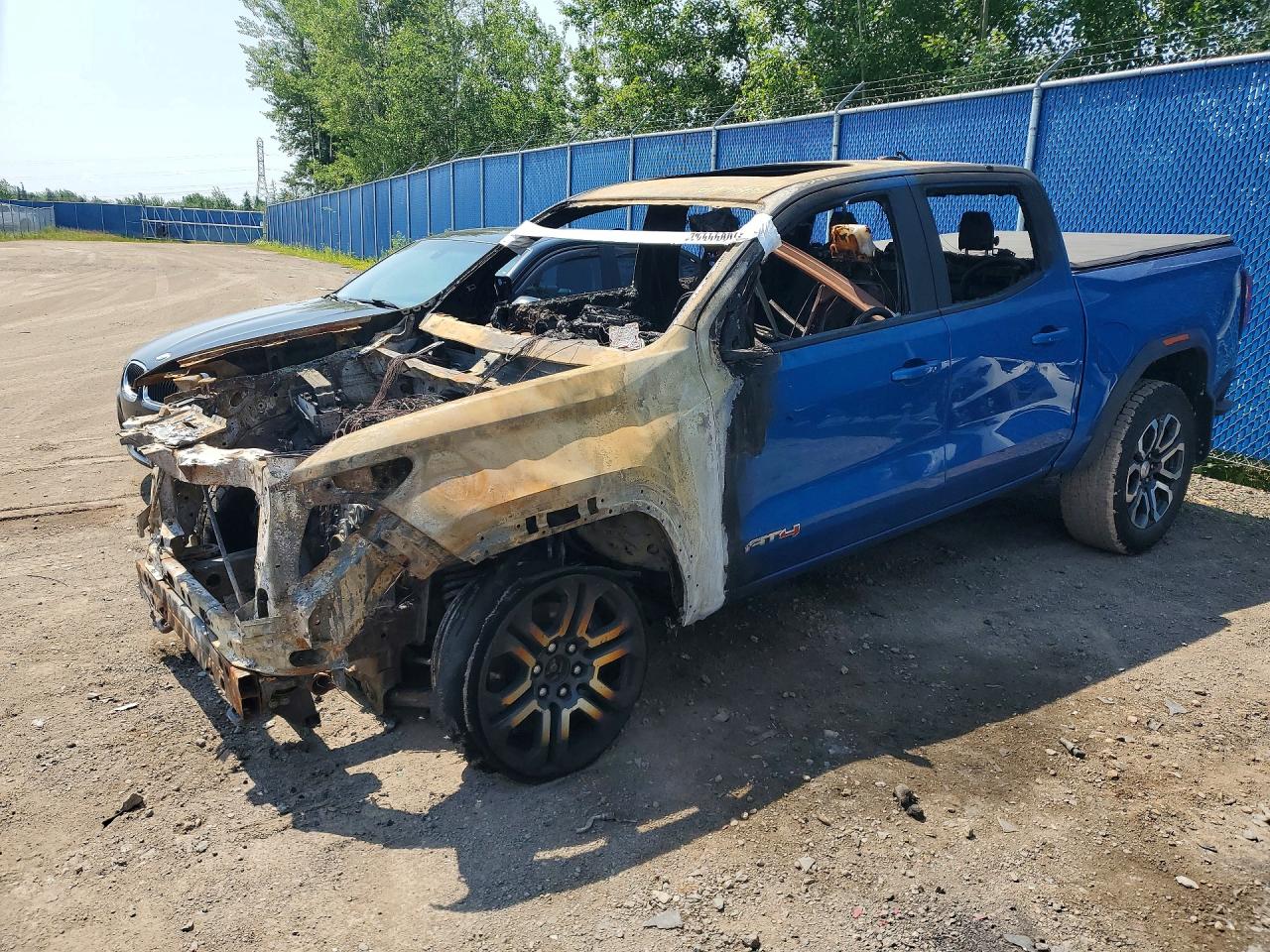 2023 GMC Canyon 4WD AT4, VIN 1GTP6DEK3P1267748 — Burn