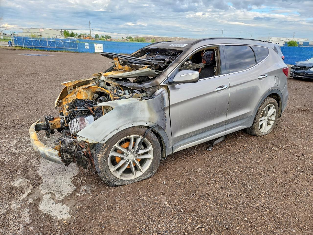 2018 Hyundai Santa Fe 2.0T, VIN 5NMZUDLA8JH070581 — Engine fire