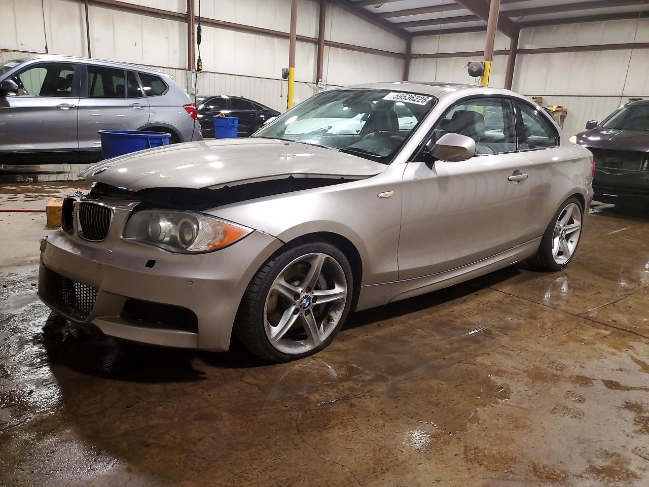2011 BMW 1 Series 135i, VIN WBAUC9C52BVM11407 — Front end