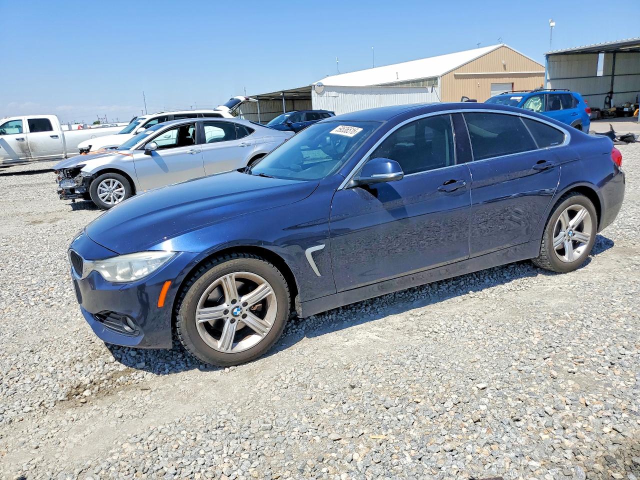 2015 BMW 4 Series 428i xDrive, VIN WBA4A7C57FD413756 — Side