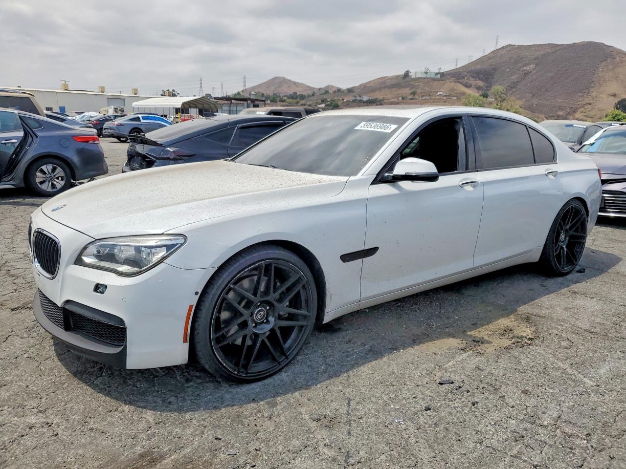 2015 BMW 7 Series 750Li, VIN WBAYE8C53FD781878 — Minor dents and scratches