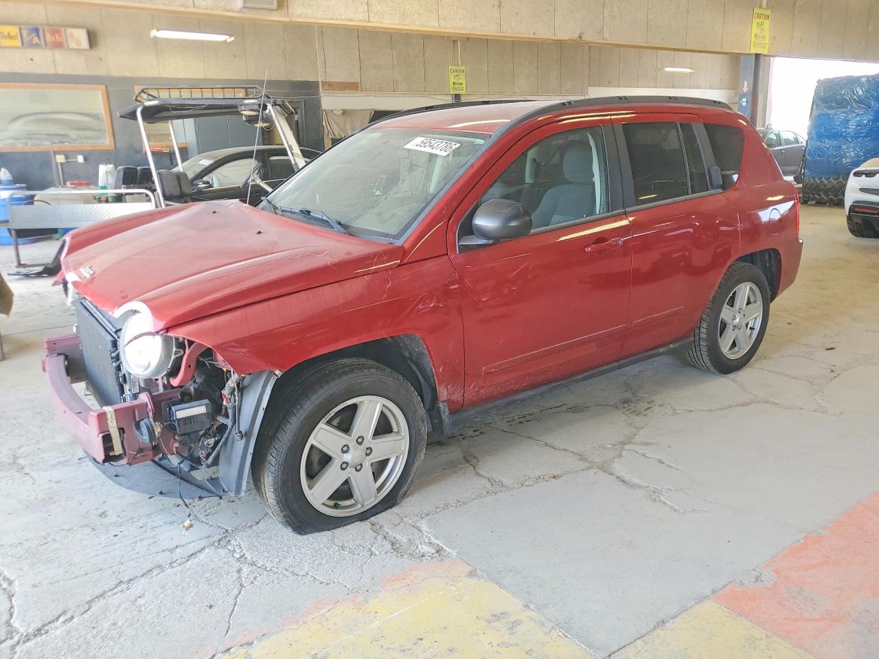 2010 Jeep Compass Sport, VIN 1J4NT4FA6AD504755 — Front end