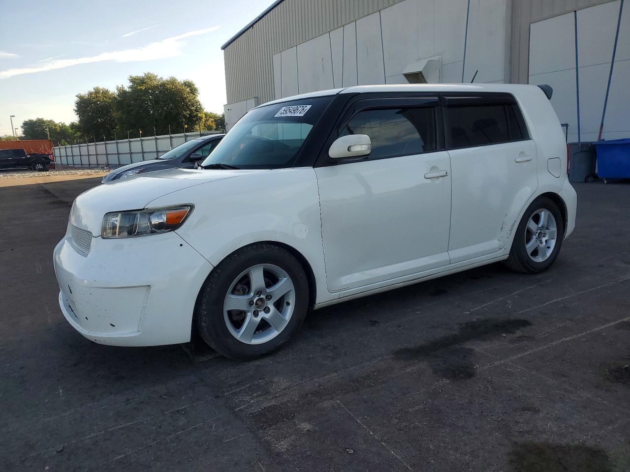 2011 Scion xB, VIN JTLZE4FE7B1120060 — Side