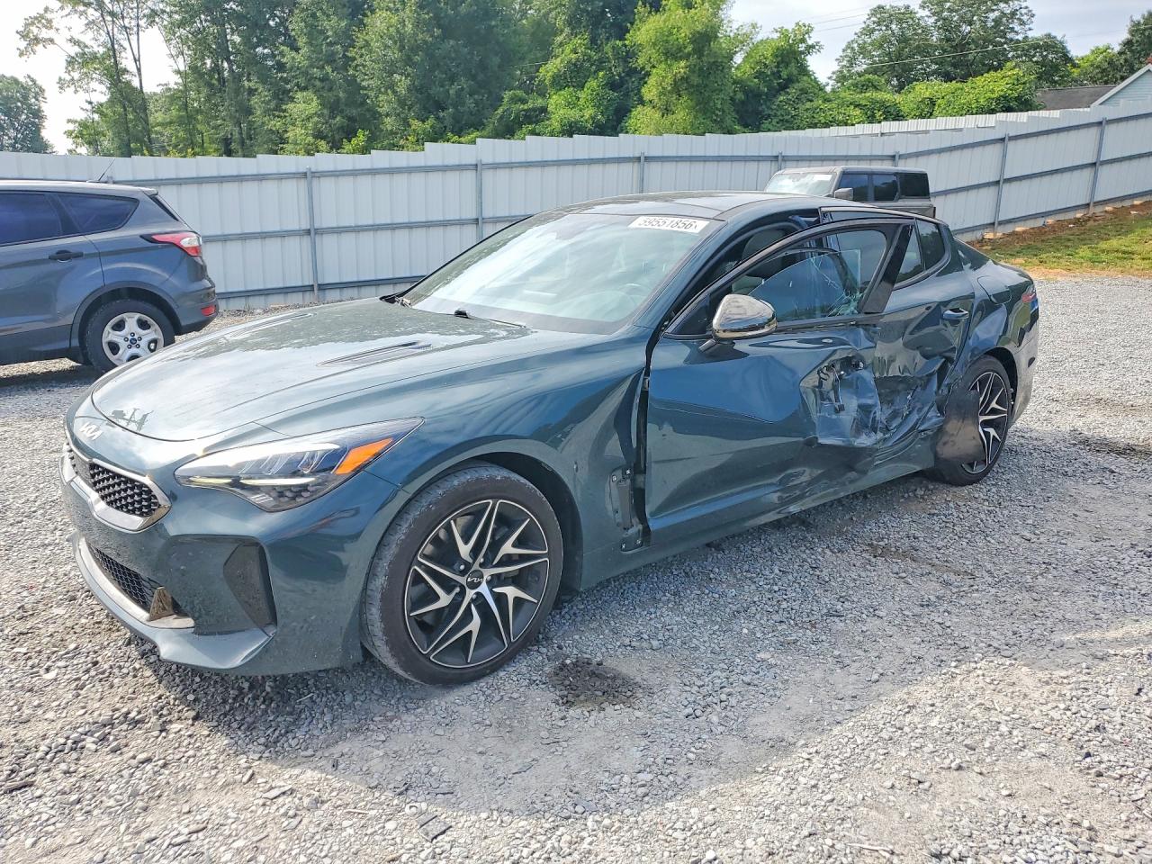 2023 Kia Stinger GT-Line, VIN KNAE35LD3P6123000 — Side
