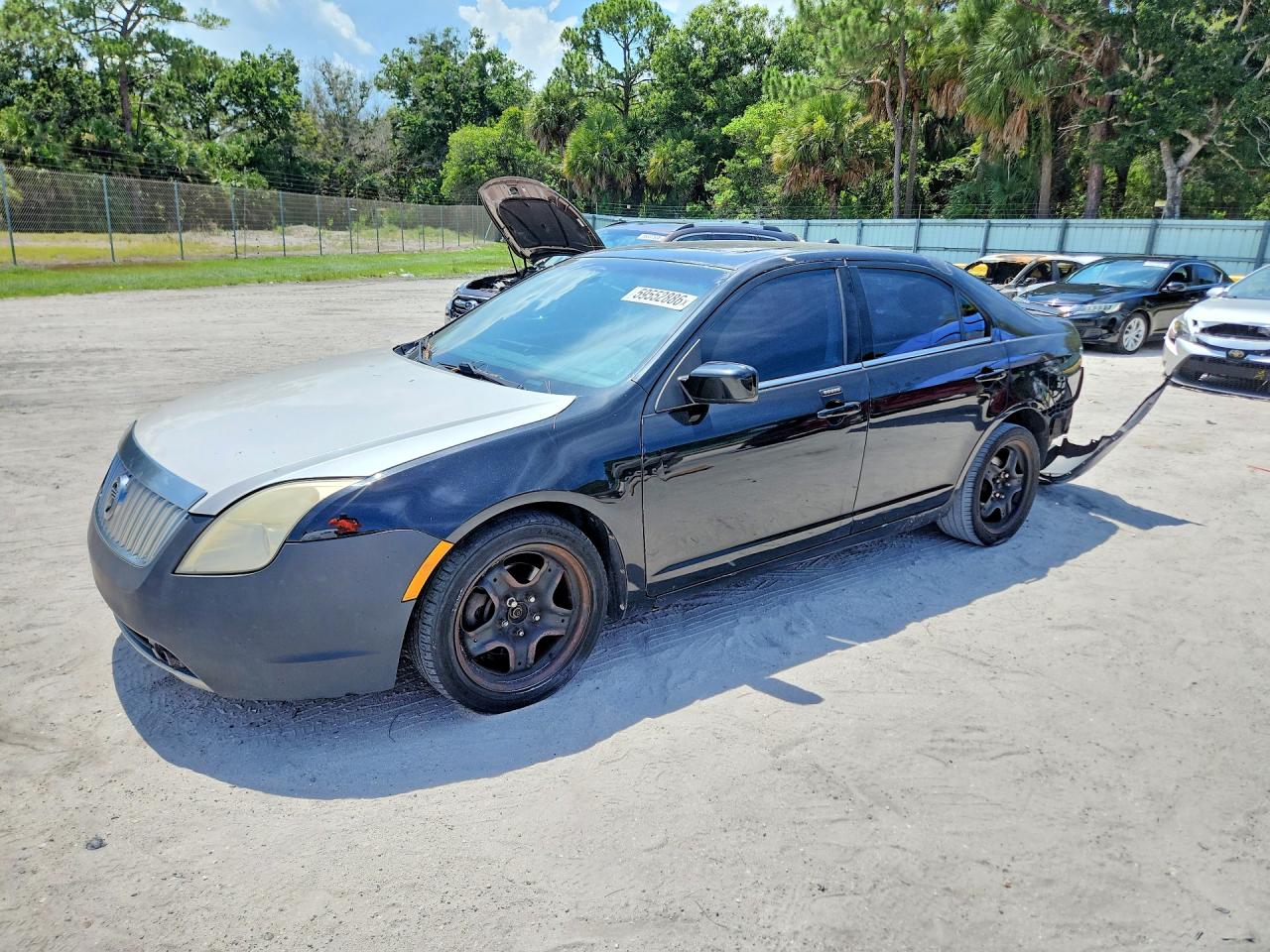 2011 Mercury Milan, VIN 3MEHM0HA9BR600571 — Rear end