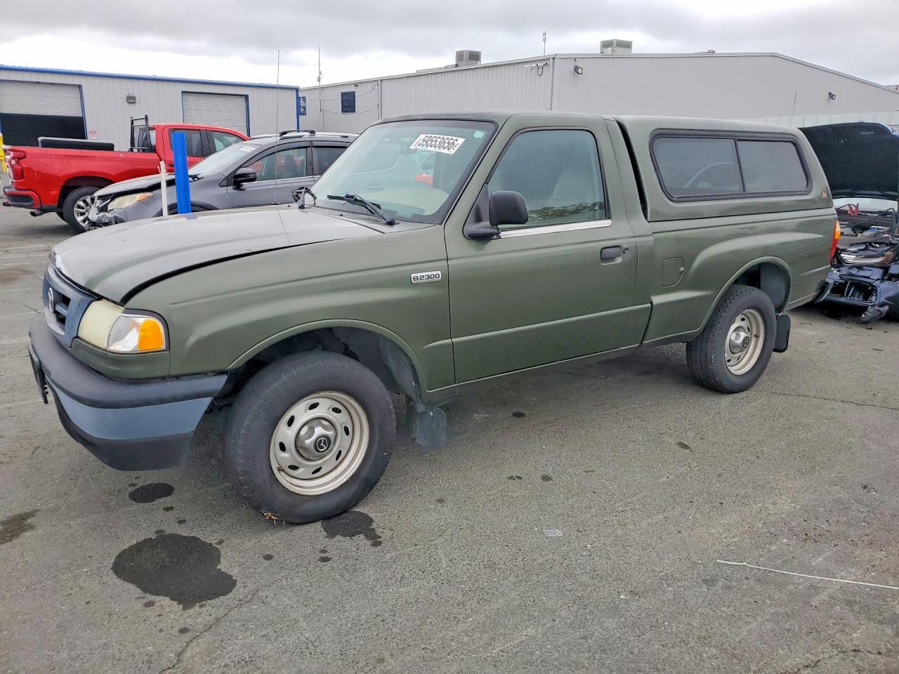 2002 Mazda B-Series SX, VIN 4F4YR12D02TM14984 — Vandalism