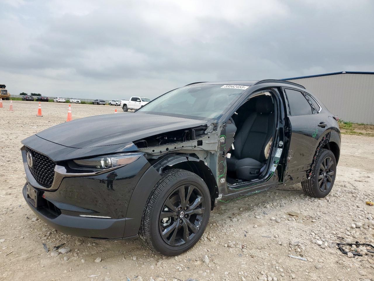 2025 Mazda CX-30 Premium, VIN 3MVDMBDY0SM804072 — Side