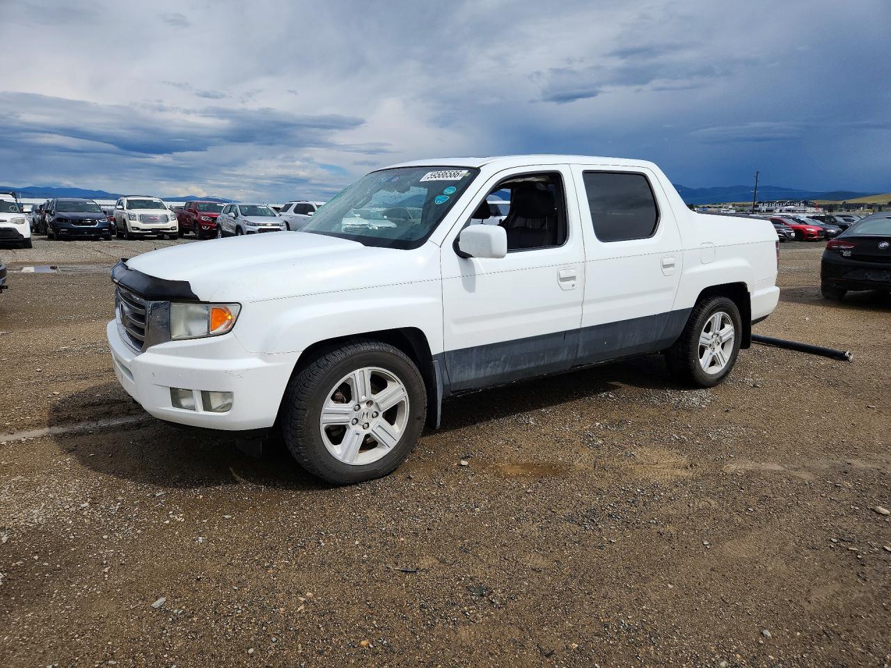 2013 Honda Ridgeline RTL, VIN 5FPYK1F52DB011666 — Rollover