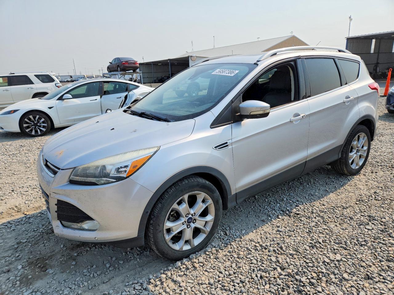 2015 Ford Escape Titanium, VIN 1FMCU9J96FUB62098 — Hail