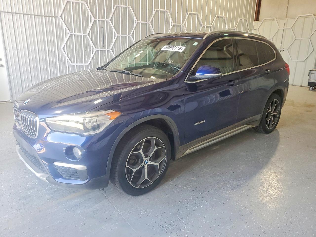 2018 BMW X1 xDrive28i, VIN WBXHT3C38J5K23024 — Minor dents and scratches