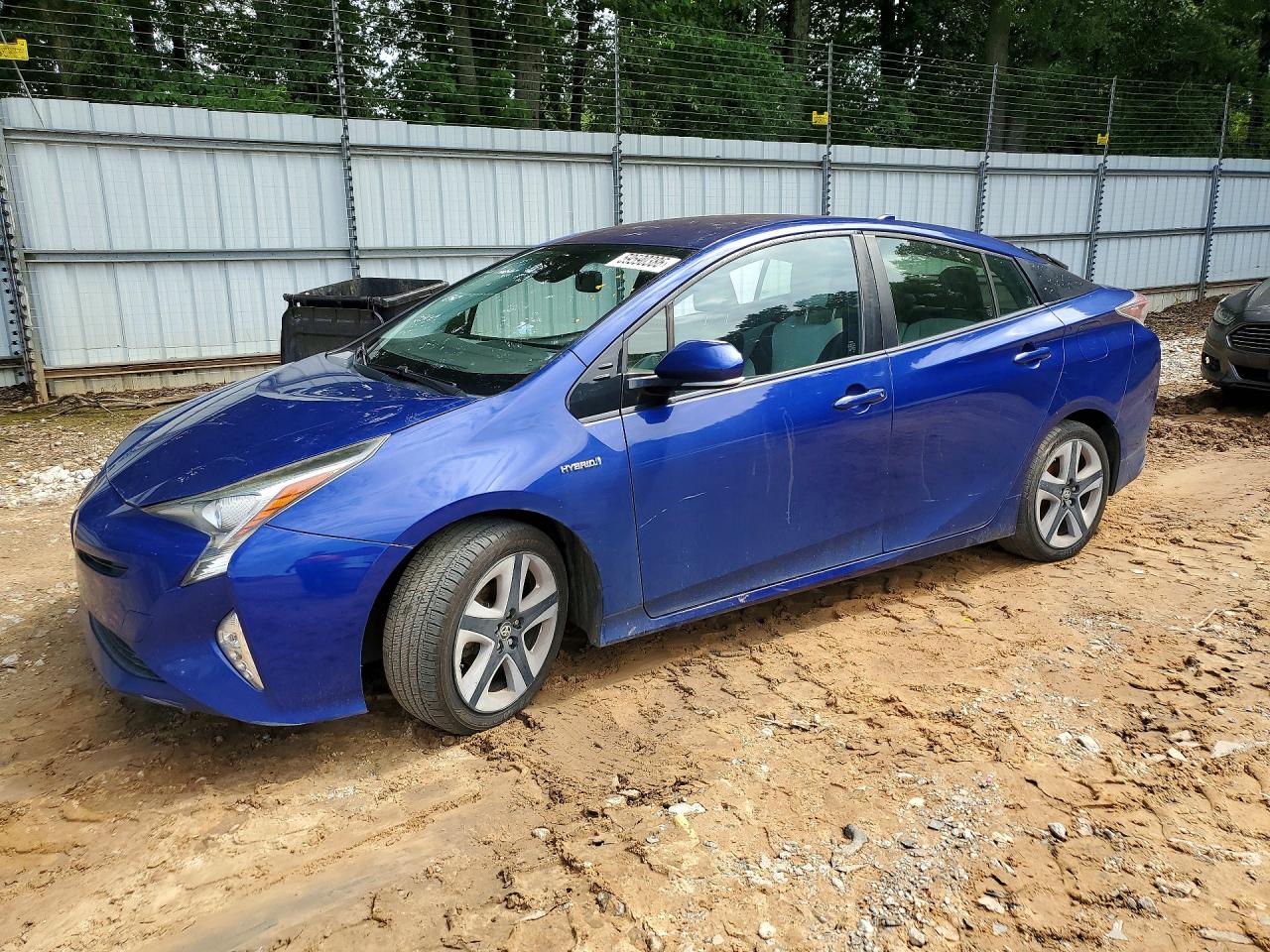 2017 Toyota Prius Four Touring, VIN JTDKARFU2H3532123 — Side