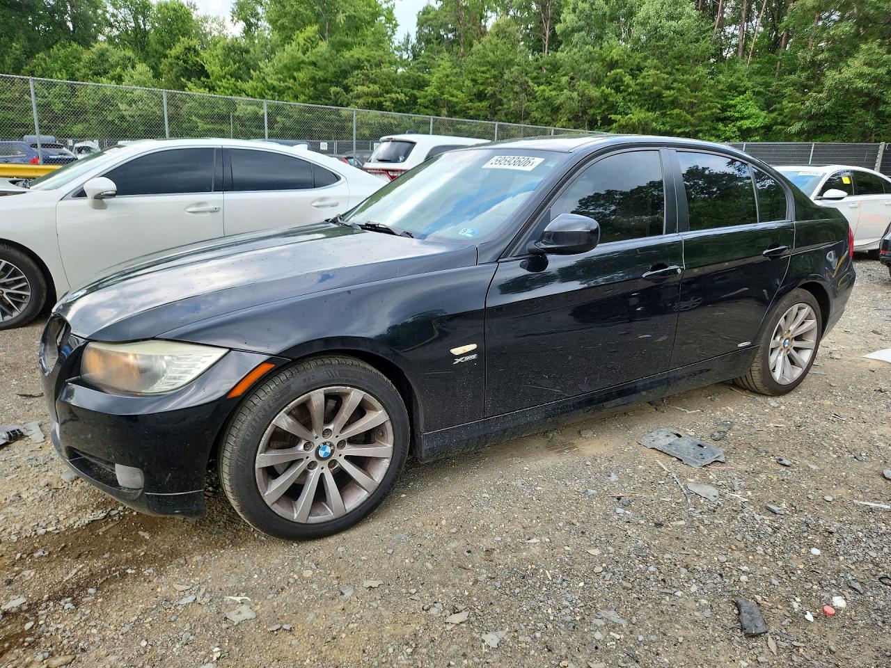 2011 BMW 3 Series 328i xDrive, VIN WBAPK7C57BA973282 — Side