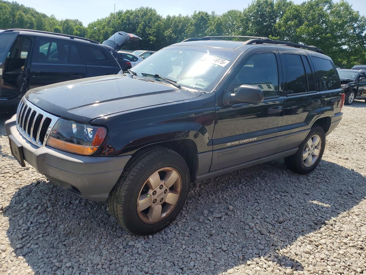 2001 Jeep Grand Cherokee Laredo, VIN 1J4GW48S81C571787 — Бок