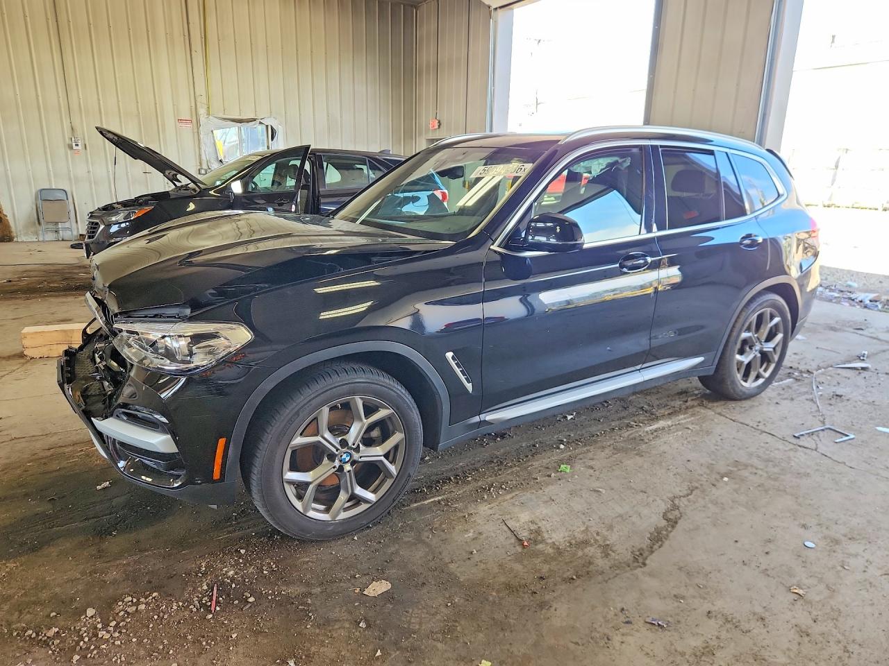 2021 BMW X3 xDrive30i, VIN 5UXTY5C04M9E37789 — Rear end