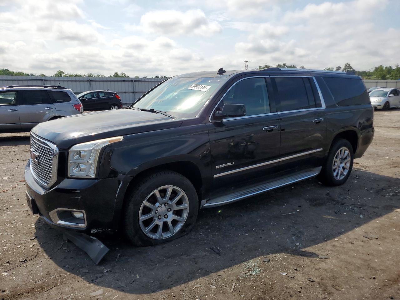 2015 GMC Yukon XL Denali, VIN 1GKS2JKJ3FR150160 — Minor dents and scratches