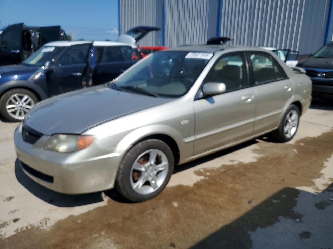 2003 Mazda Protege DX, VIN JM1BJ225X31203163 — Зад