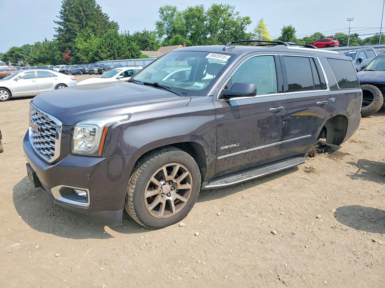 2018 GMC Yukon Denali, VIN 1GKS2CKJ4JR176139 — Бок