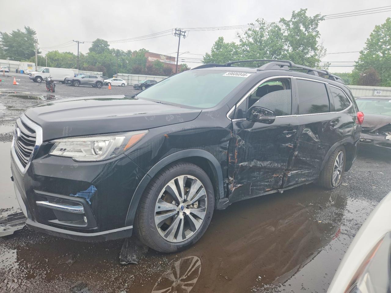 2019 Subaru Ascent Limited, VIN 4S4WMAPD6K3437009 — Side