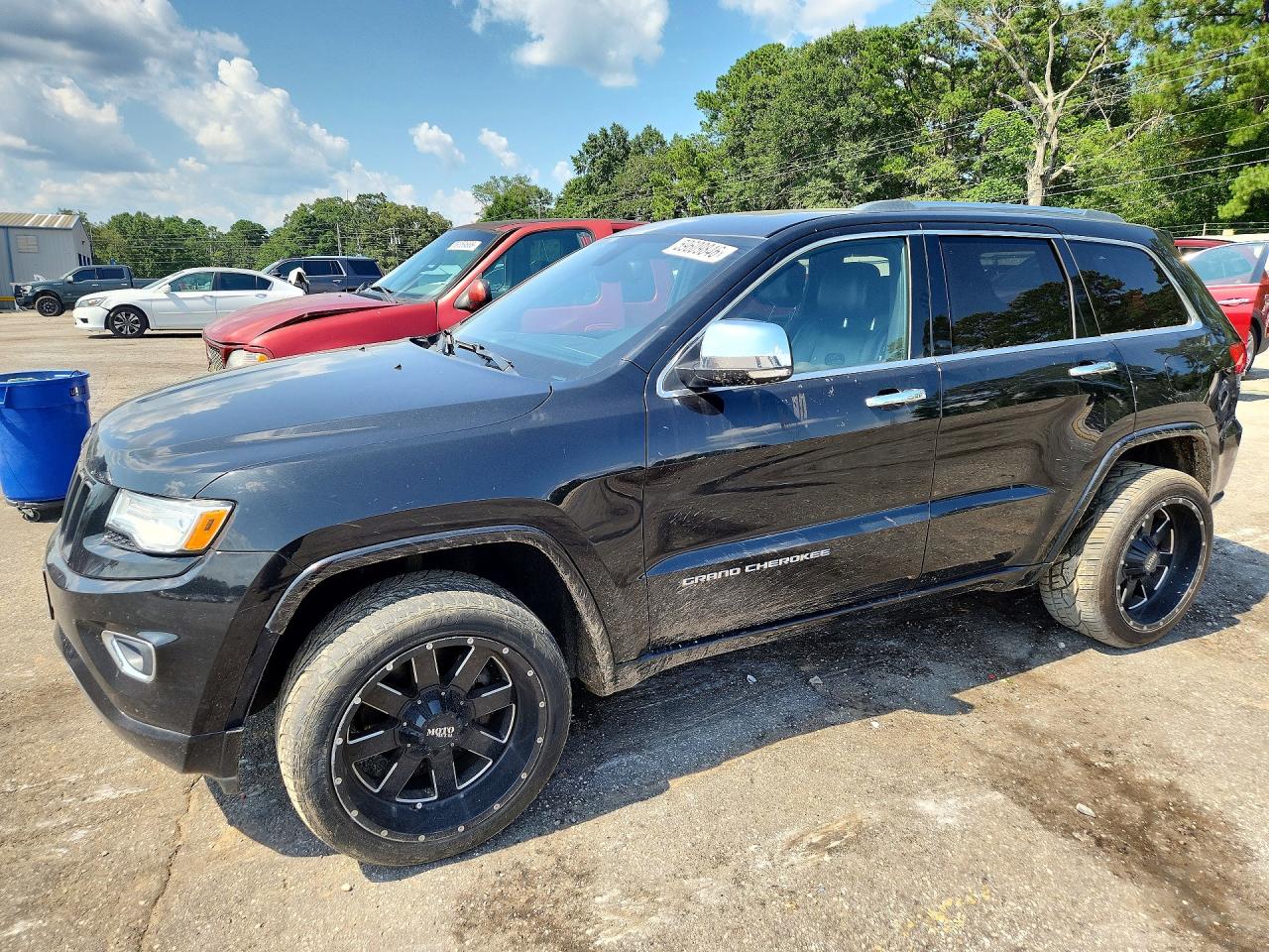 2015 Jeep Grand Cherokee Overland, VIN 1C4RJFCG8FC705782 — Minor dents and scratches