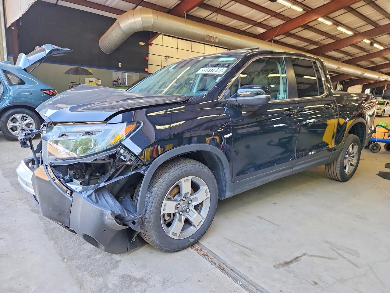 2025 Honda Ridgeline RTL, VIN 5FPYK3F59SB040655 — Front end