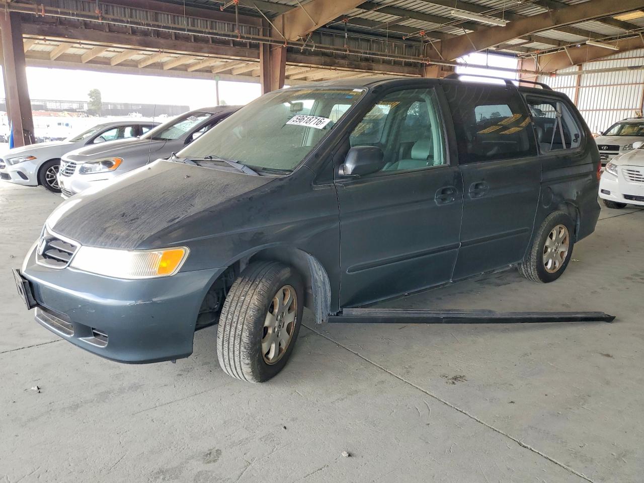 2003 Honda Odyssey EX-L, VIN 5FNRL18733B026149 — Side
