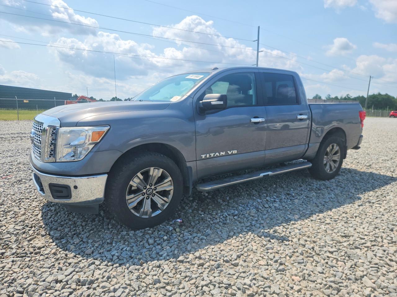 2019 Nissan Titan Platinum Reserve, VIN 1N6AA1E54KN522290 — Side