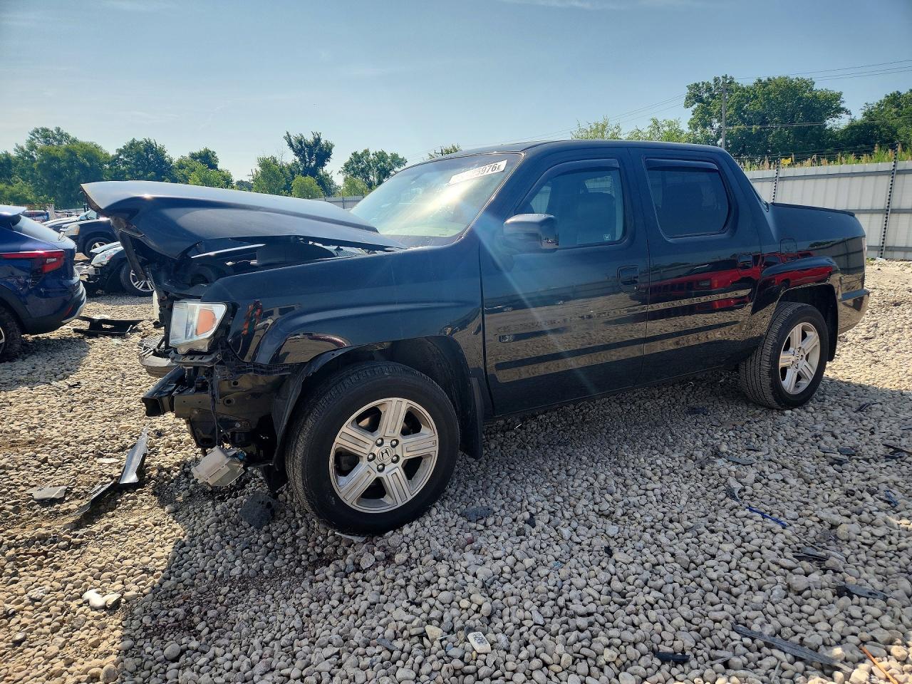 2012 Honda Ridgeline RTL, VIN 5FPYK1F58CB460820 — Front end