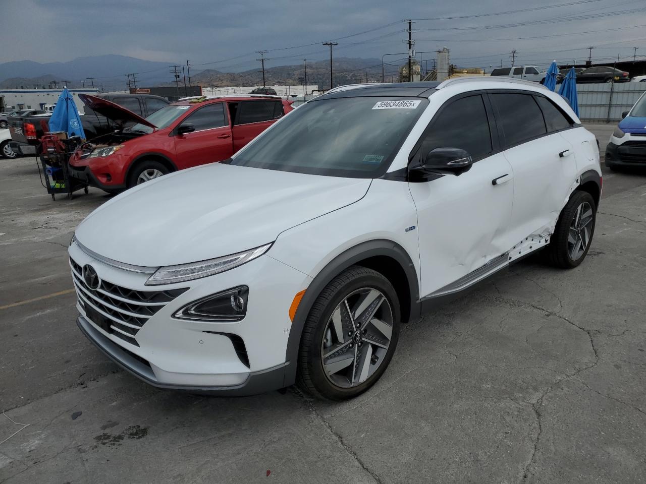 2022 Hyundai NEXO Limited, VIN KM8J84A66NU027173 — Side