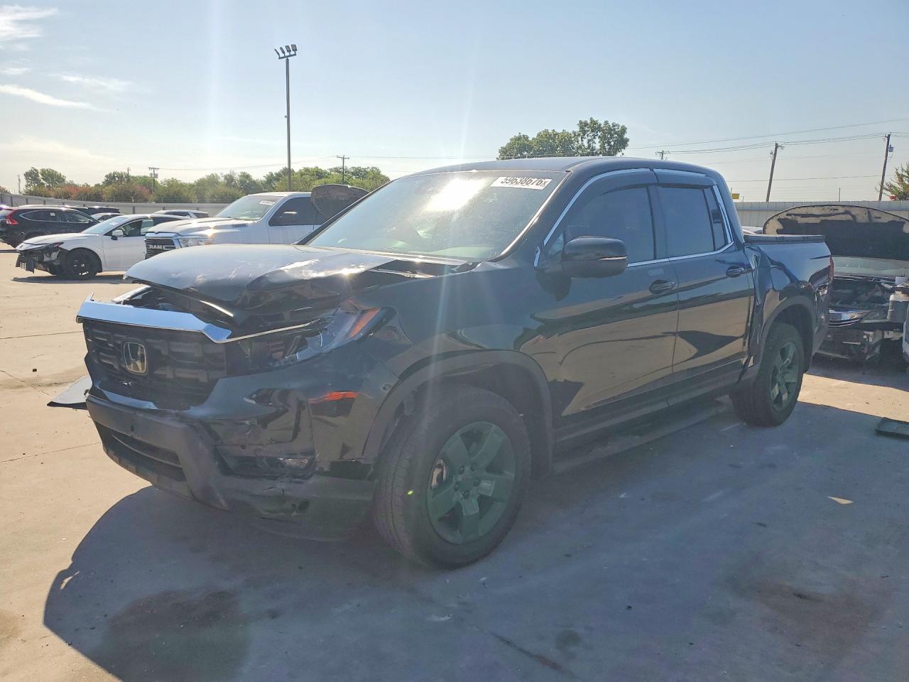 2026 Honda Ridgeline RTL, VIN 5FPYK3F55TB014085 — Front end