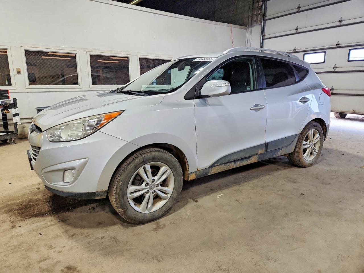 2013 Hyundai Tucson GLS, VIN KM8JUCAC6DU624169 — Undercarriage