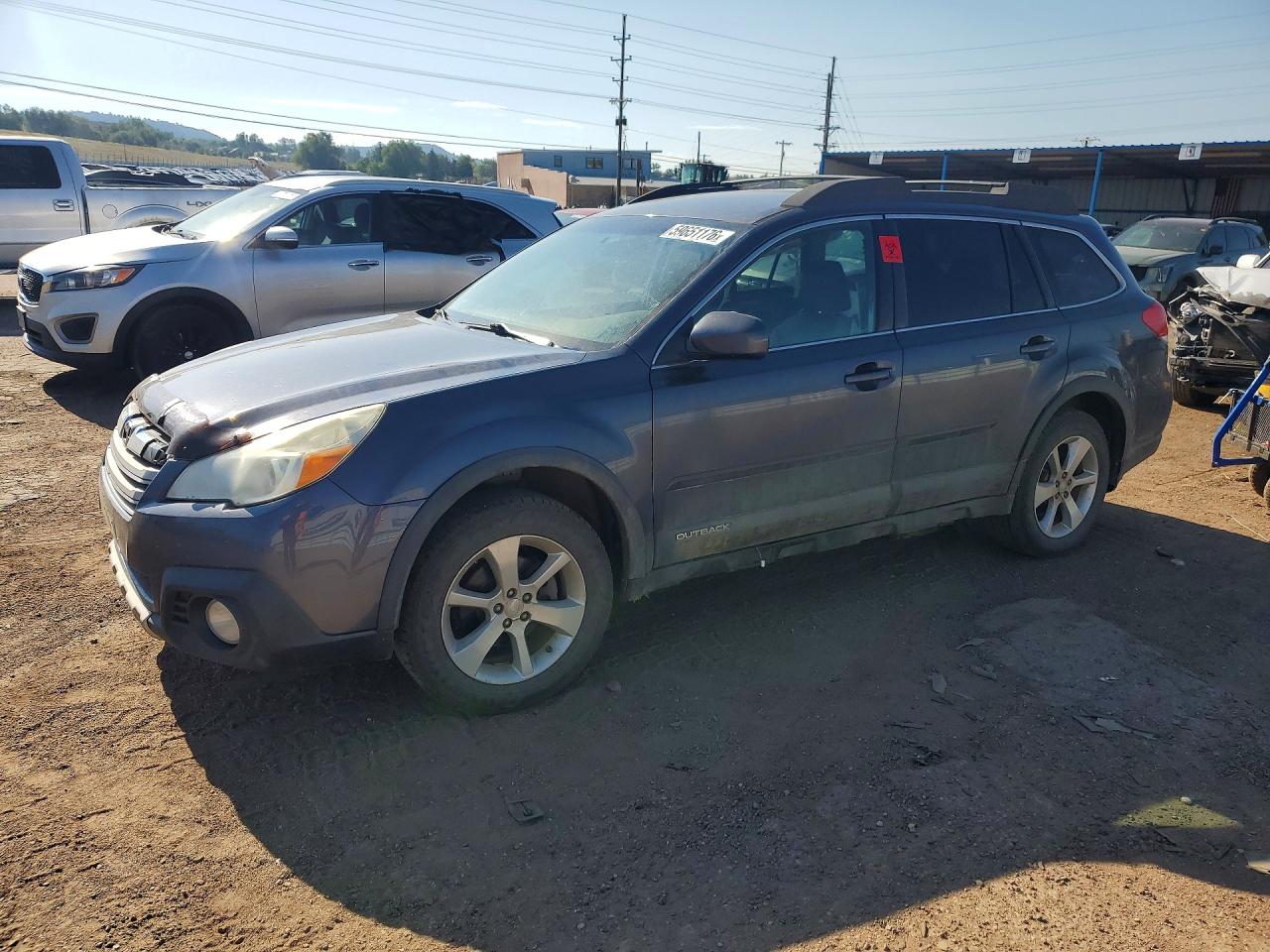 2014 Subaru Outback Limited, VIN 4S4BRCKC5E3284105 — Vandalism