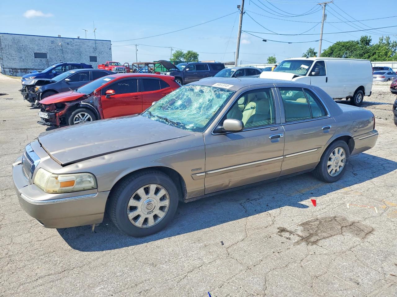 2006 Mercury Grand Marquis LS Premium, VIN 2MEHM75V56X610117 — Hail