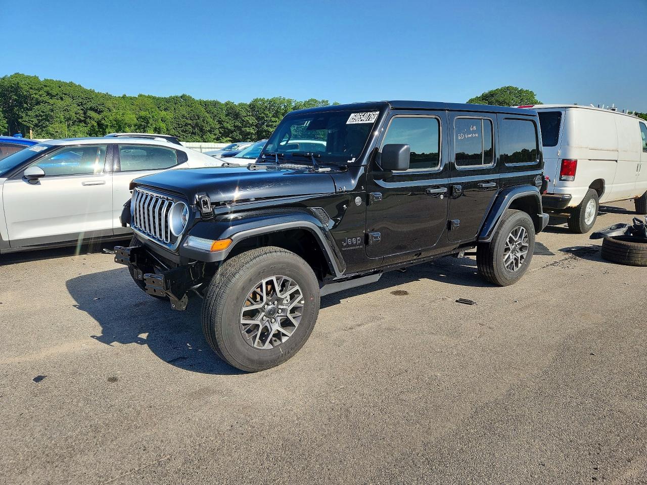 2026 Jeep Wrangler Sahara, VIN 1C4PJXEG5TW254282 — Front end