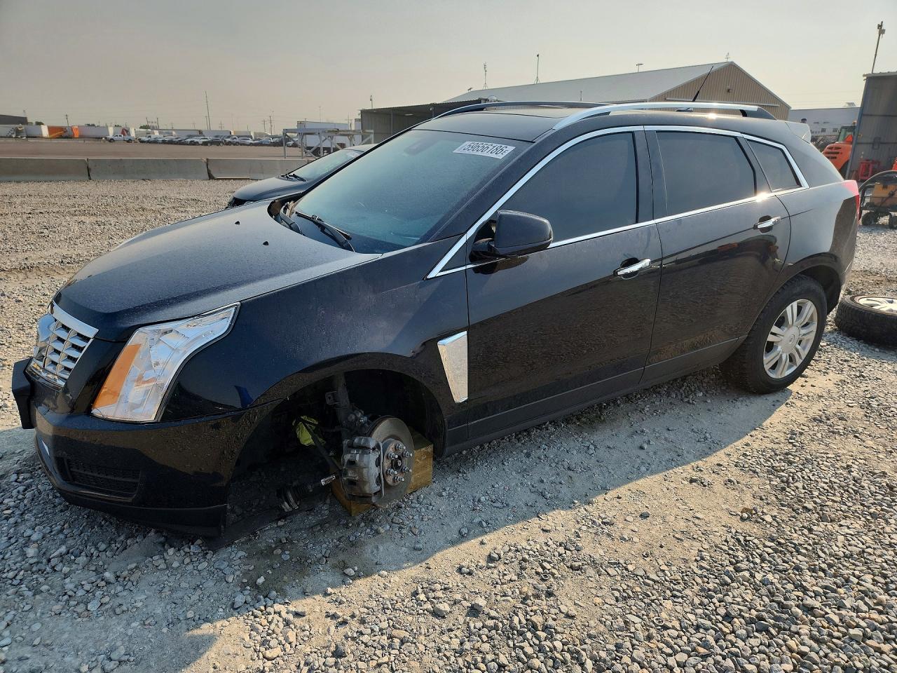 2013 Cadillac SRX Luxury Collection, VIN 3GYFNGE30DS650365 — Undercarriage
