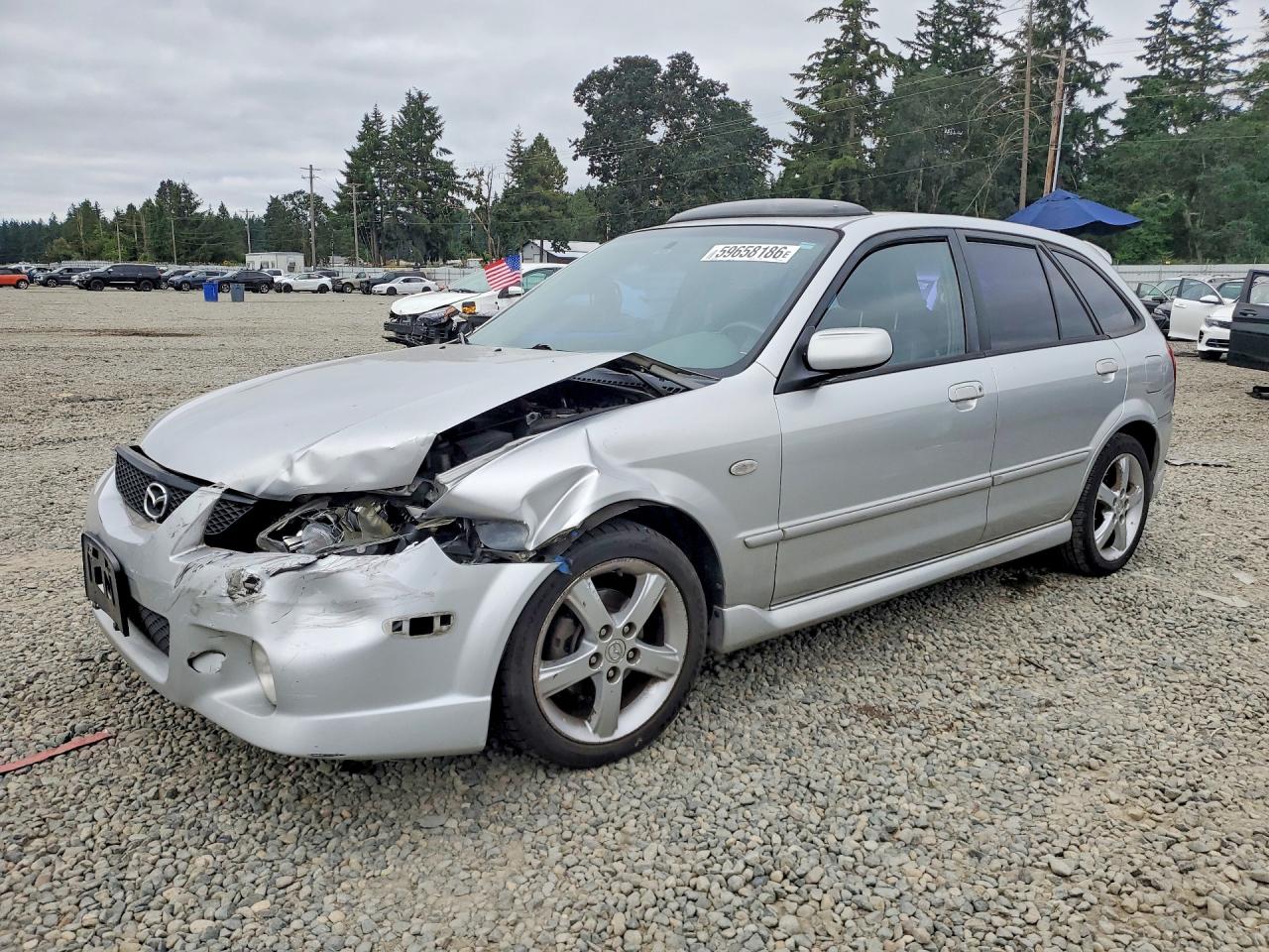 2003 Mazda Protege, VIN JM1BJ245231154330 — Перед
