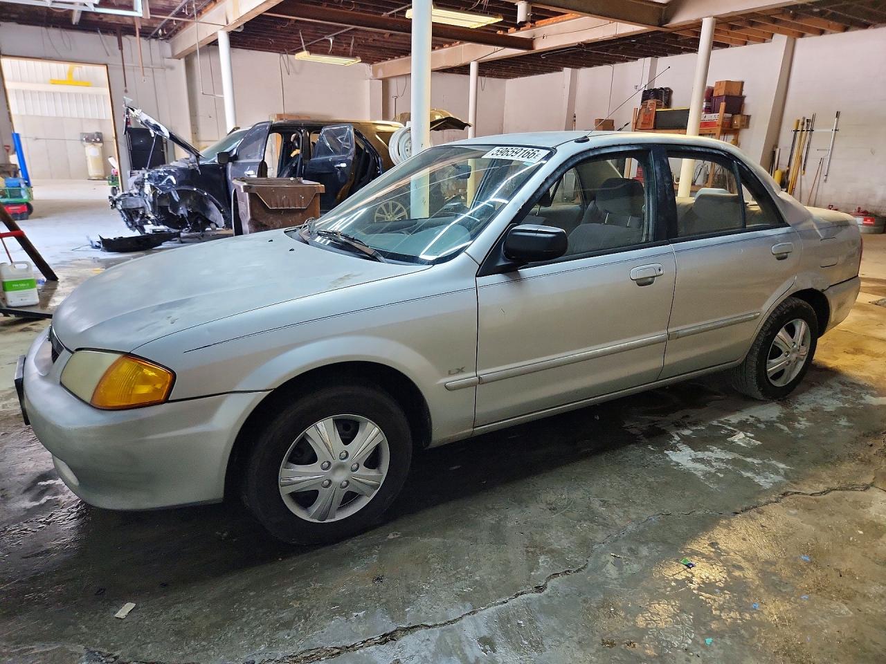 1999 Mazda Protege DX, VIN JM1BJ2220X0134923 — Крыша