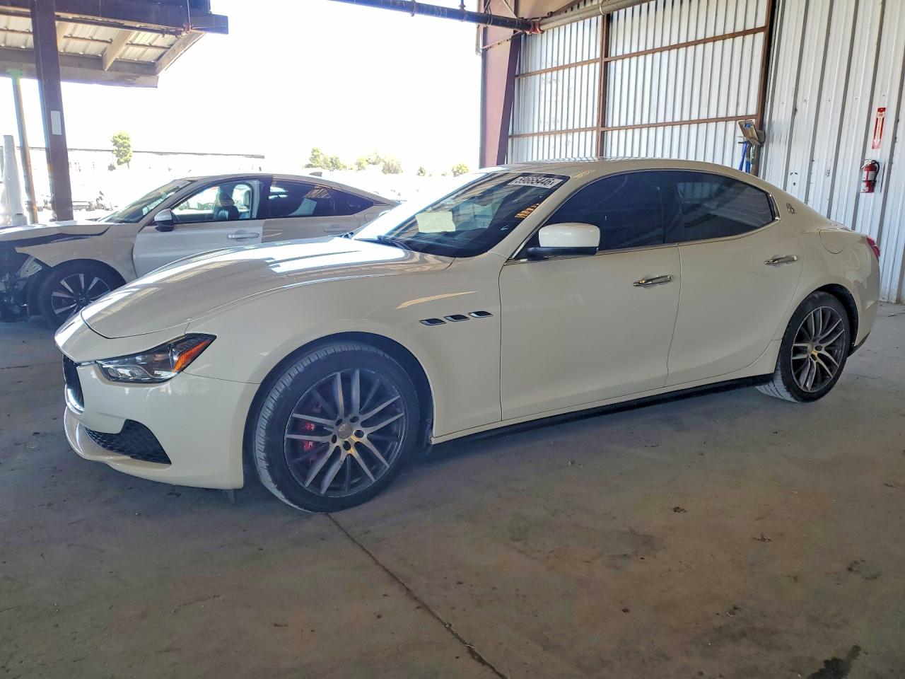 2015 Maserati Ghibli, VIN ZAM57XSA4F1131589 — Мелкие вмятины и царапины