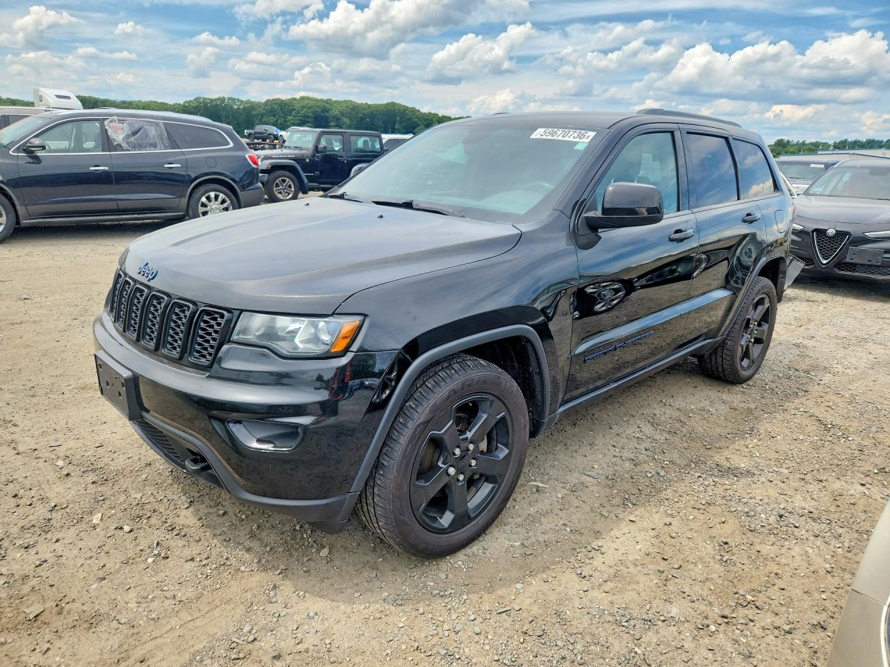 2019 Jeep Grand Cherokee Altitude, VIN 1C4RJFAG1KC700551 — Rear end