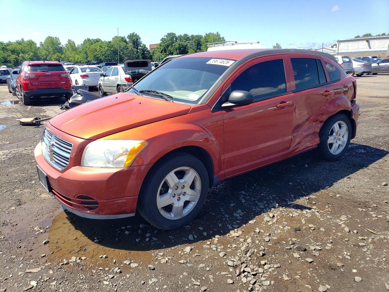 2009 Dodge Caliber SXT, VIN 1B3HB48A69D198057 — Бок